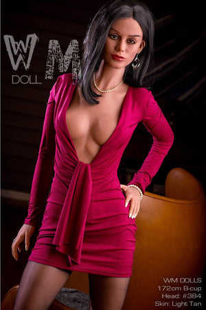 Sex toy doll in a pink dress with visible branding on a dark background